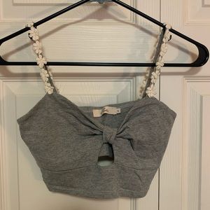 Women’s S bralette with floral straps.